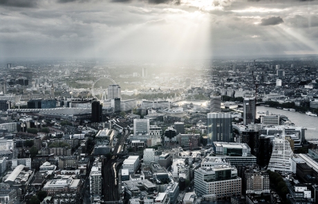 London, Aerial views, city of london, aerial photograph, aerial, city view, Thames, sunlight breaking through clouds over the city, shafts of light